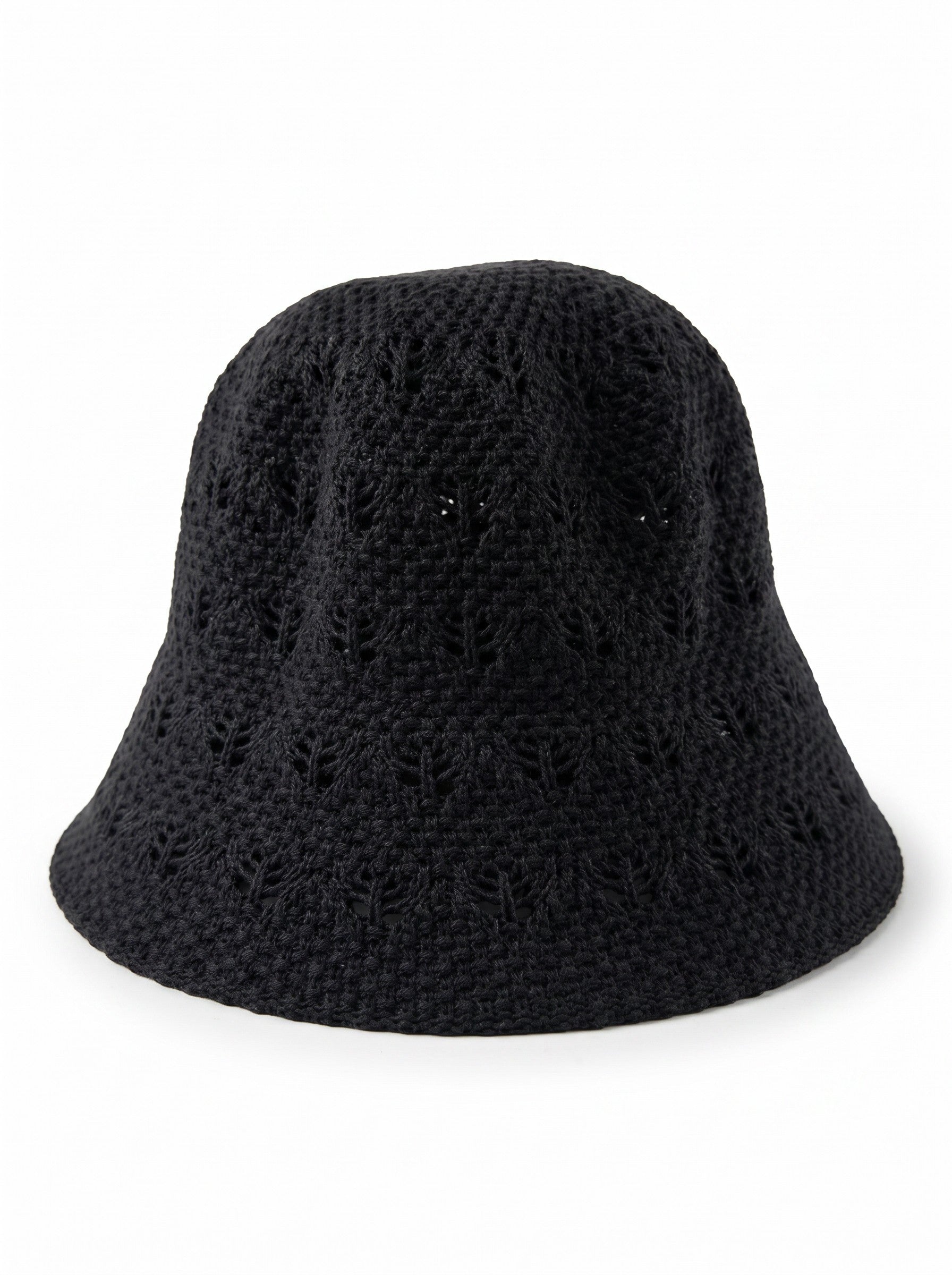 Color's Wholesale black crocheted cotton bucket hat with openwork detail and decorative flower appliqué.