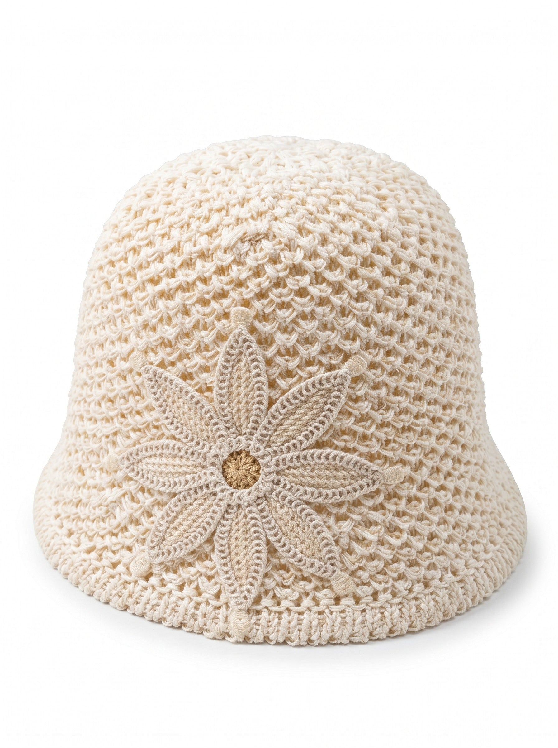 Color's Wholesale cream crocheted cotton bucket hat with large daisy appliqué and textured knit.