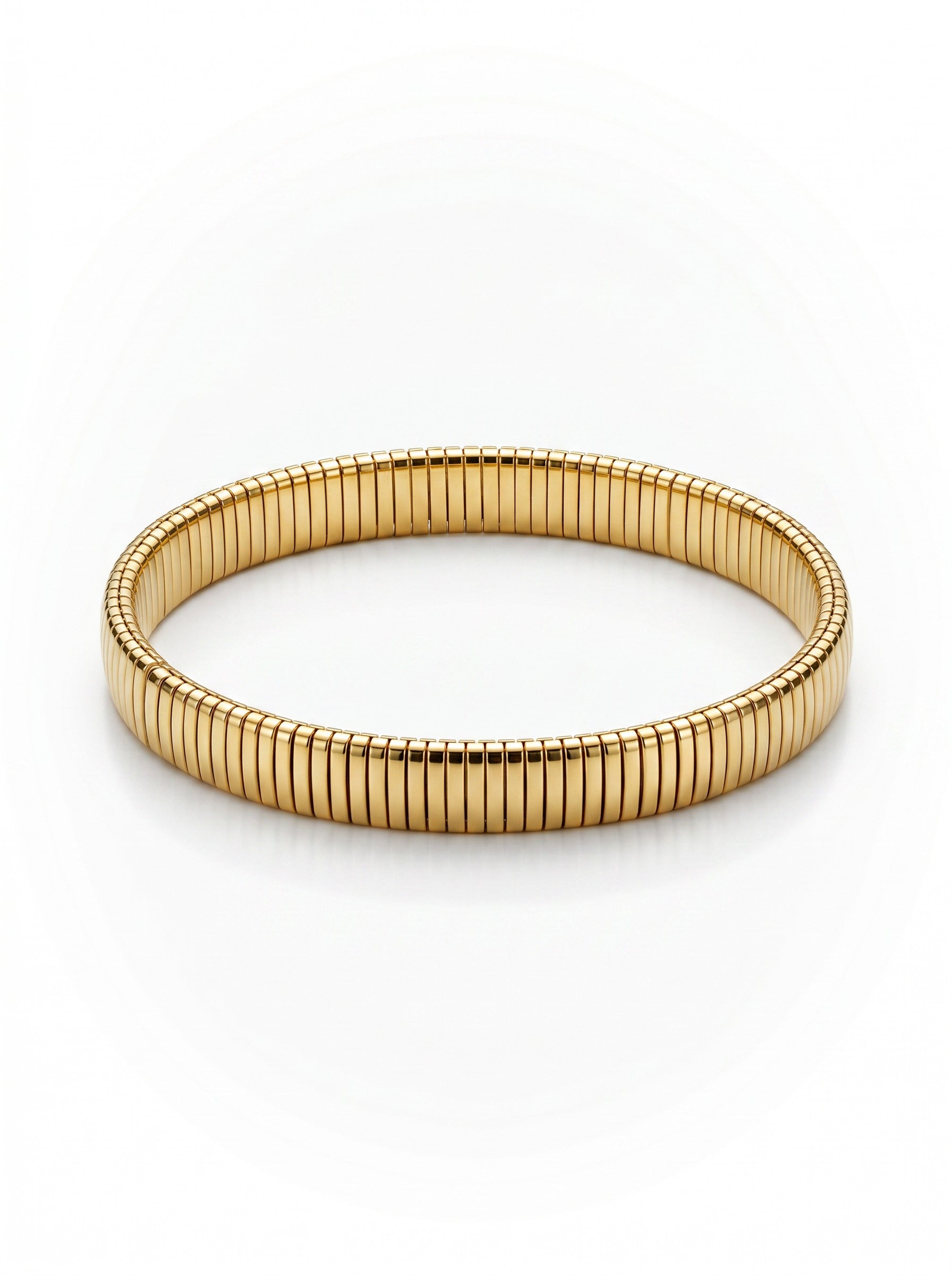 Color's Wholesale gold-tone stretch bracelet featuring a sleek, segmented metal band design on a white background.