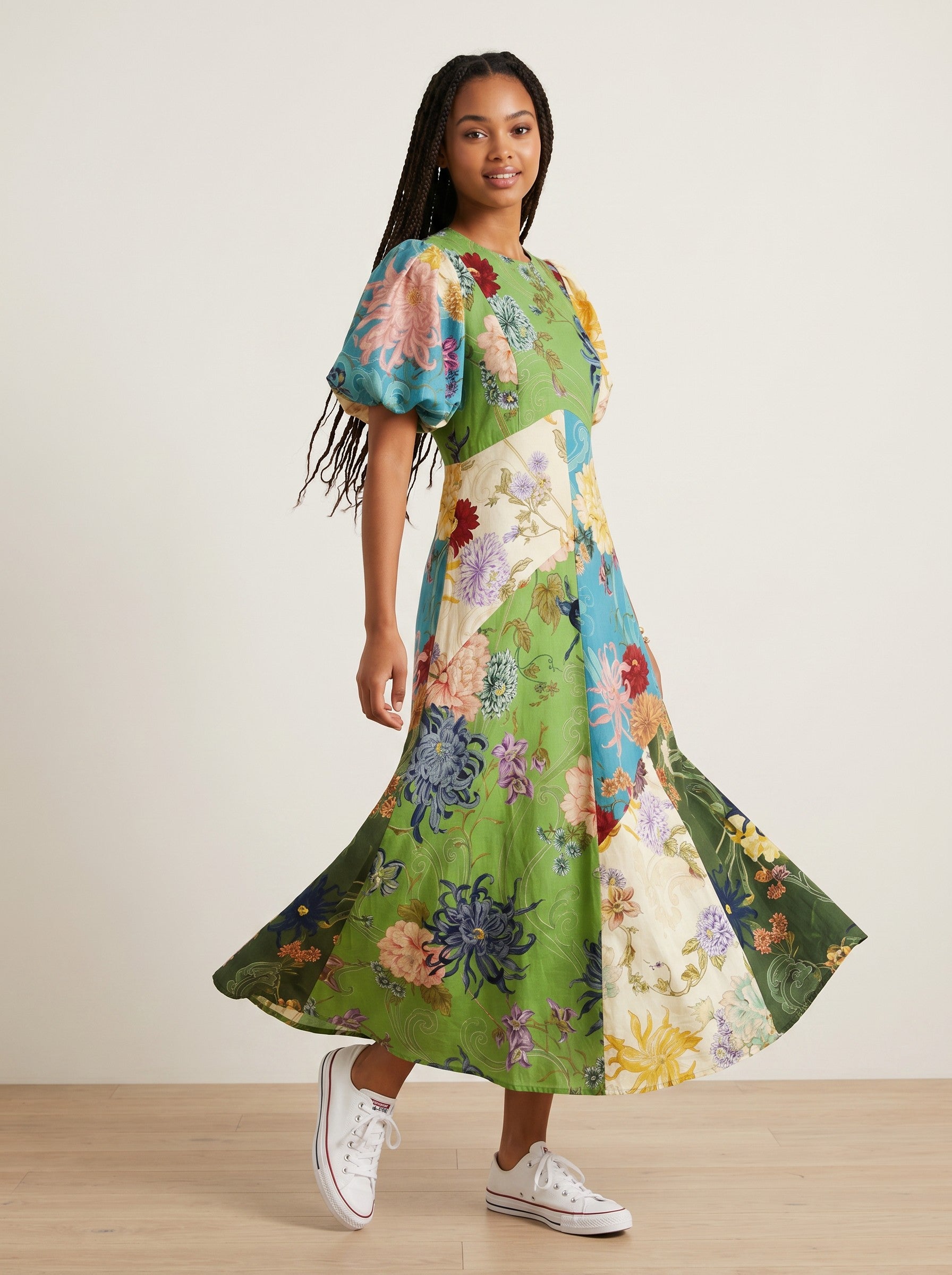 Color's Wholesale patchwork floral print midi dress with puff sleeves, made of 65% linen and 35% polyester. Fits UK 10-16.