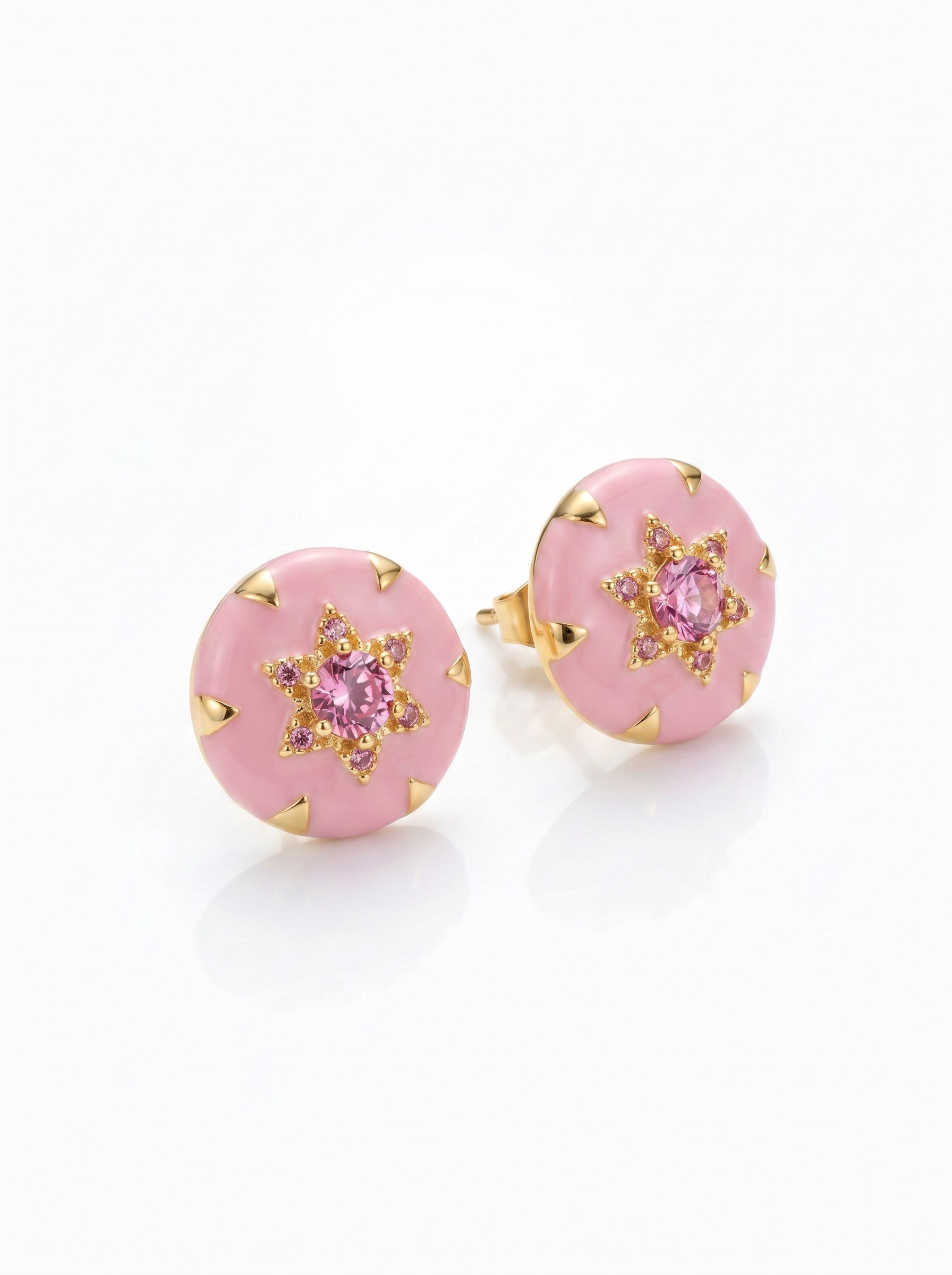 Color's Wholesale round stud earrings in gold featuring pink enamel and a central star-shaped pink crystal cluster.