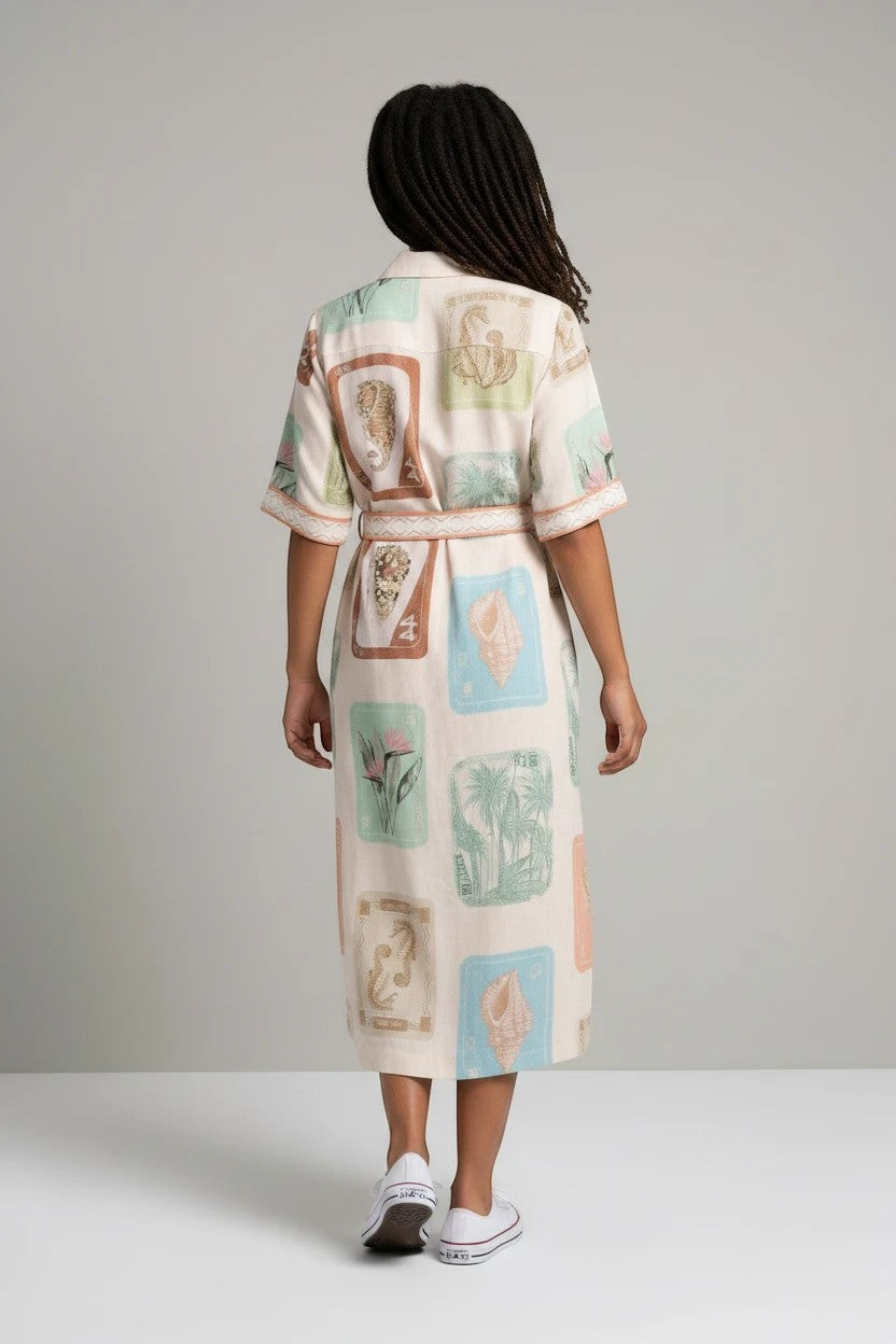Color's Wholesale cream linen shirt dress with vintage print, belt, and short sleeves.