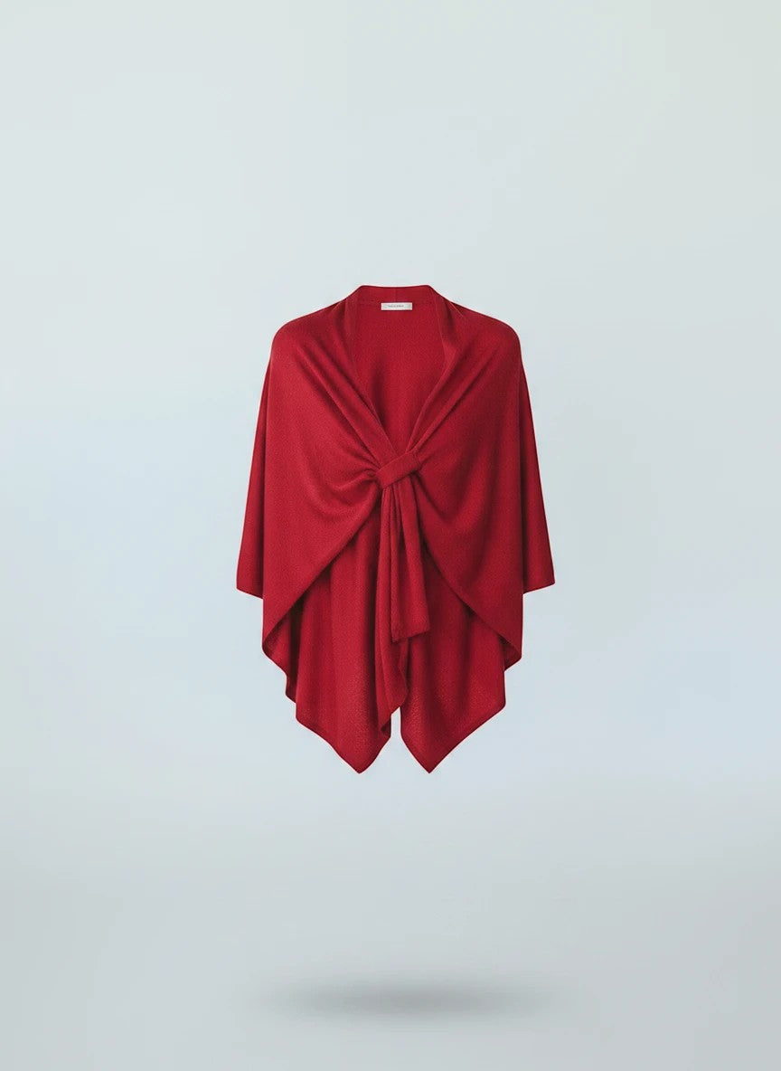 Color's Wholesale red knit wrap with a knot detail in the front, perfect for layering.