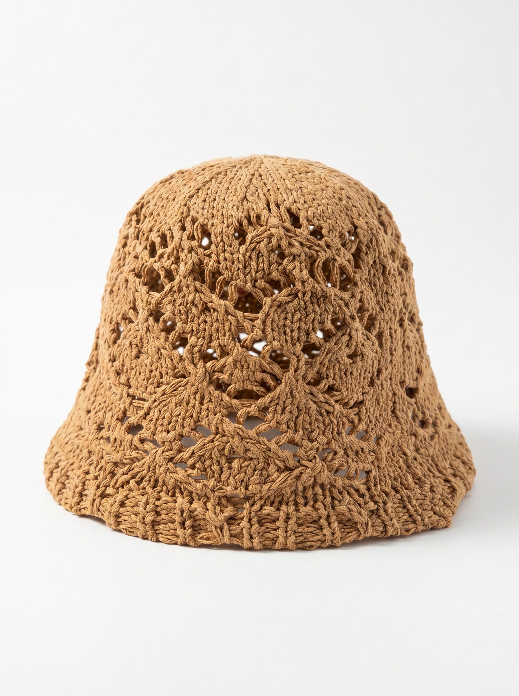 Color's Wholesale tan crocheted cotton bucket hat with openwork pattern and wide brim.