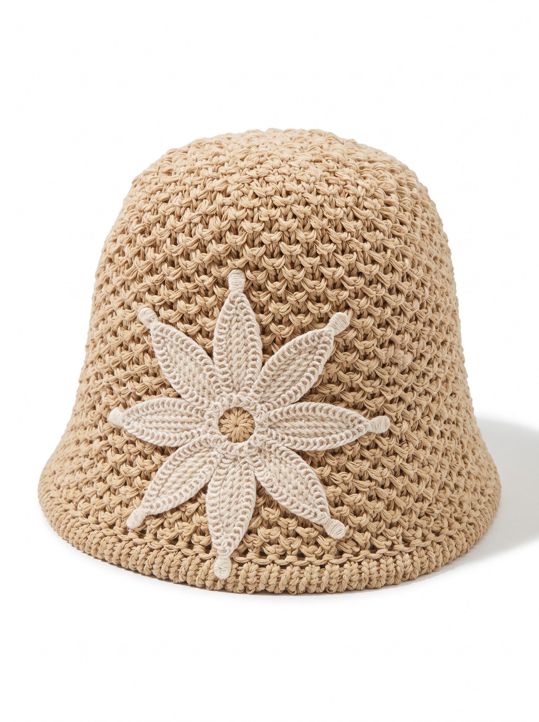 Color's Wholesale tan crocheted cotton bucket hat with a cream crocheted flower appliqué.
