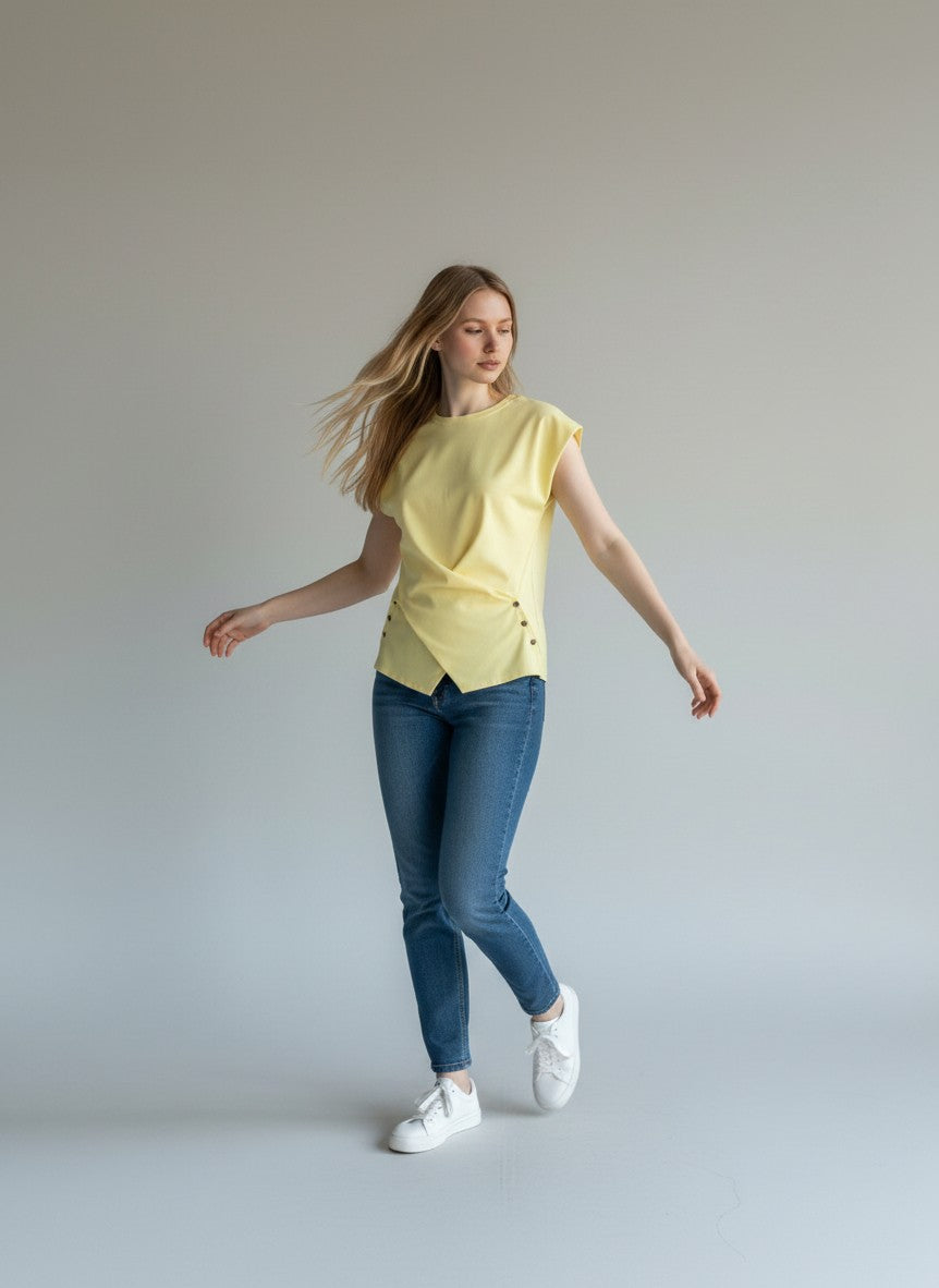 Color's Wholesale yellow polyester top with a twisted front and button details, one size fits UK 8-12.